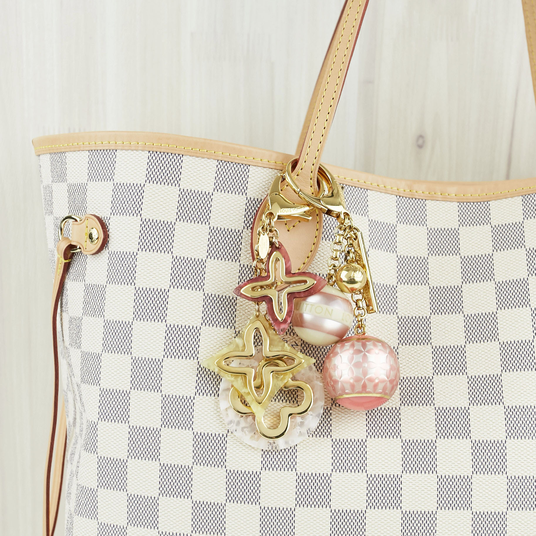 Louis Vuitton Damier Azur Neverfull Tote with Bag Charms | Yoogi's Closet Authenticated Pre-Owned Luxury yoogiscloset.com